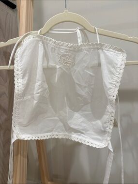 The . Garment White “Kirsten Front Top”